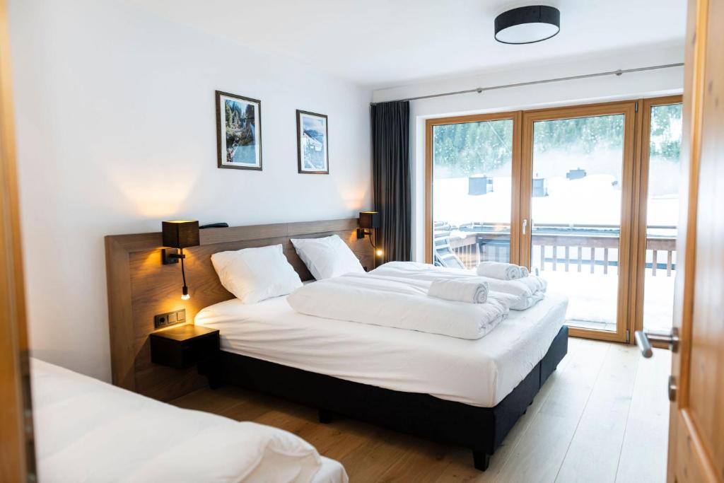 Posteľ alebo postele v izbe v ubytovaní Gerlos Alpine Estate - Gerlos