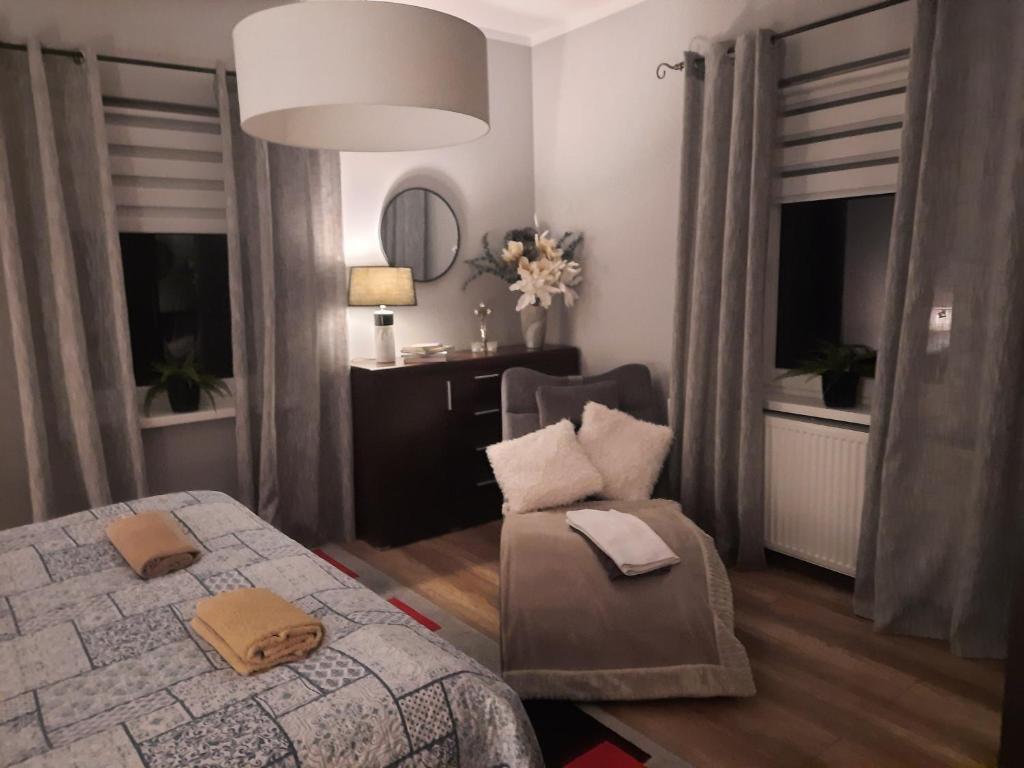 Posteľ alebo postele v izbe v ubytovaní Dom Salamandra z panoramą gór