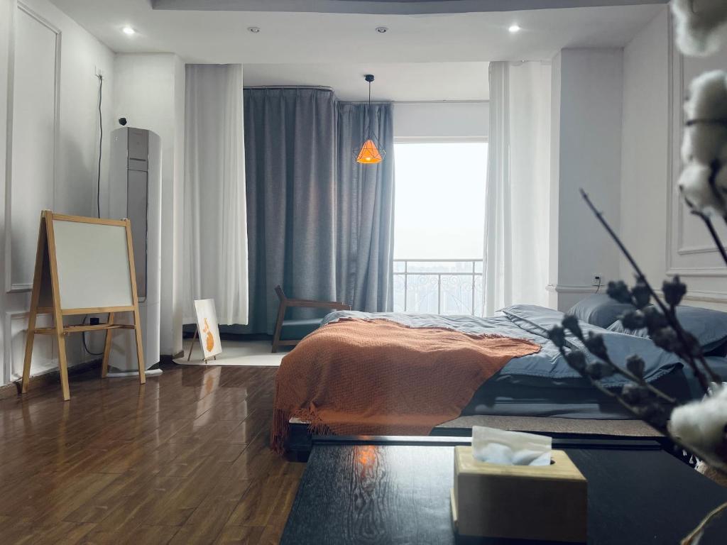 Una cama o camas en una habitación de 重庆山川的民宿二店