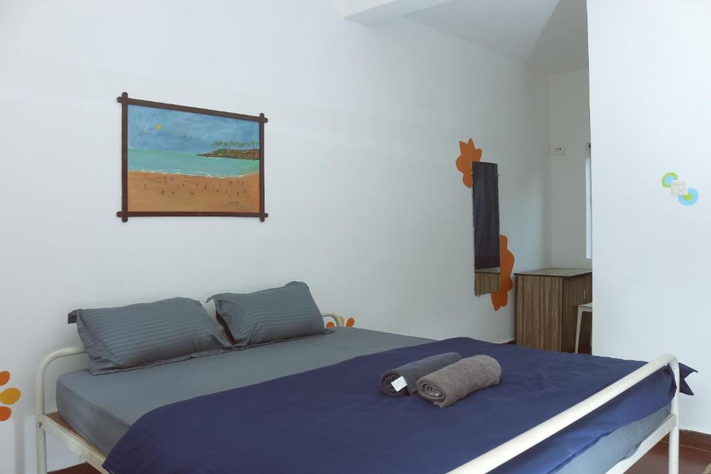 Postel nebo postele na pokoji v ubytování Summer Hostel