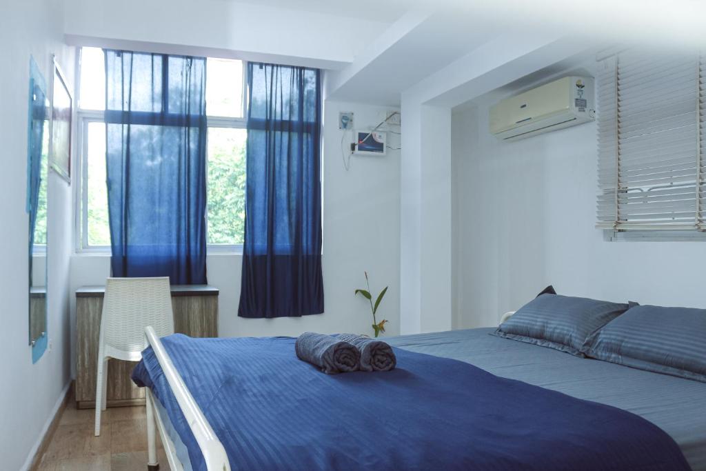 Postel nebo postele na pokoji v ubytování Summer Hostel