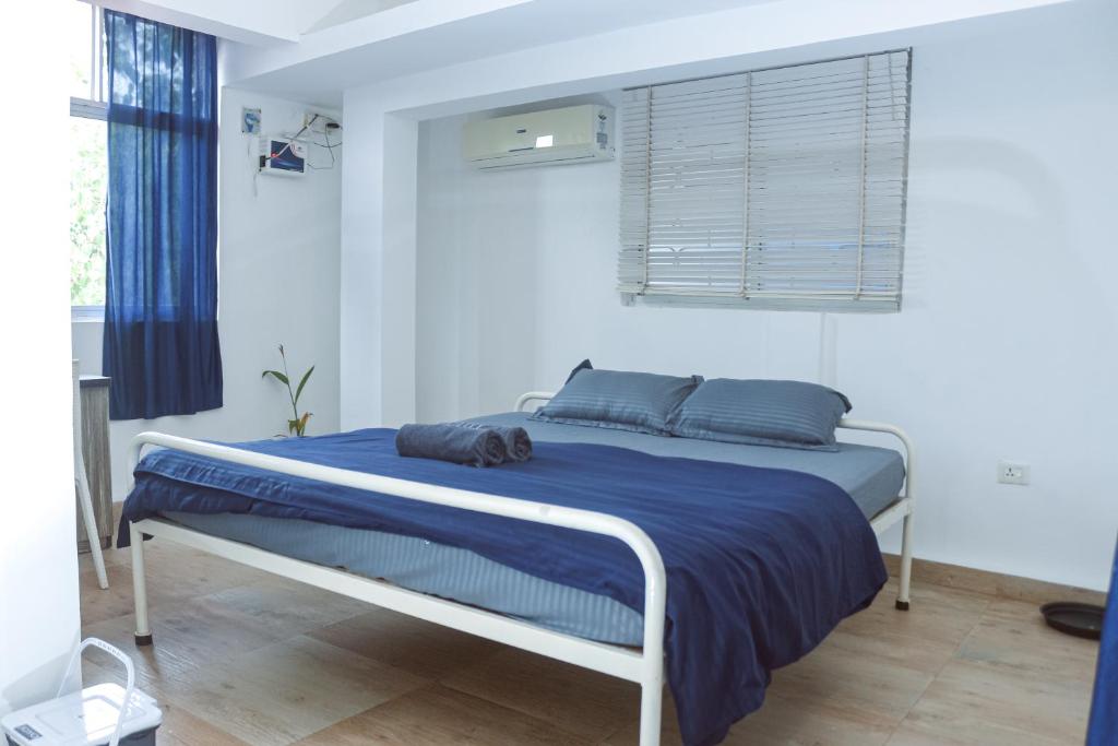 Postel nebo postele na pokoji v ubytování Summer Hostel