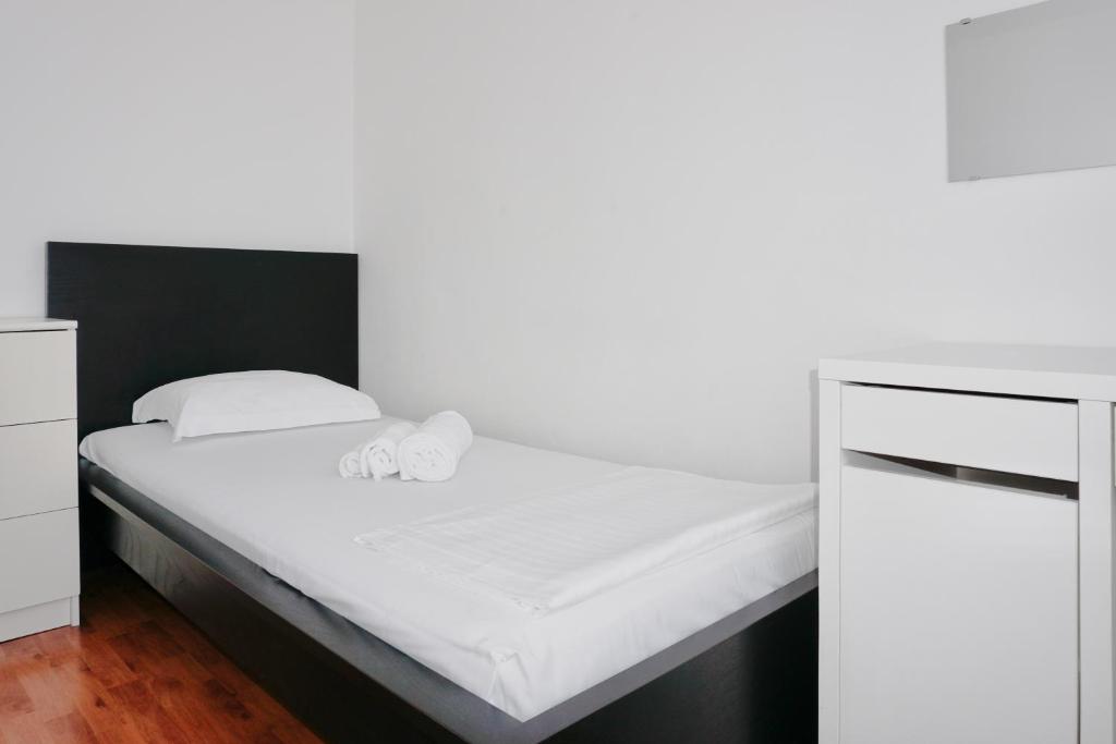 Postel nebo postele na pokoji v ubytování Alloggio Confortevole a Vimercate - Wi-Fi e Parcheggio Inclusi