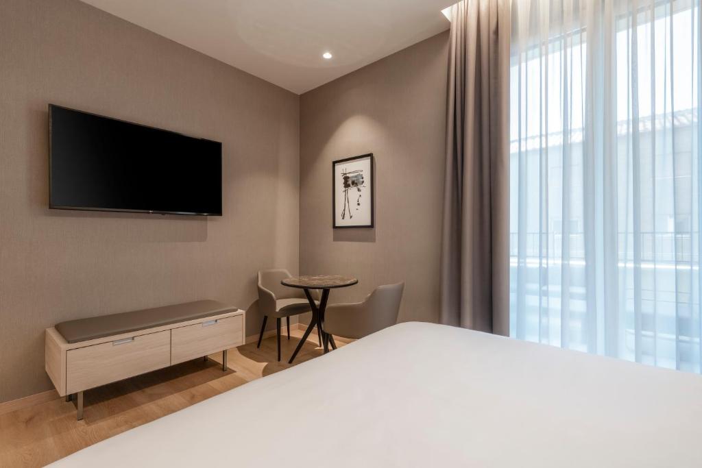 Postel nebo postele na pokoji v ubytování AC Hotel by Marriott Clodio Roma