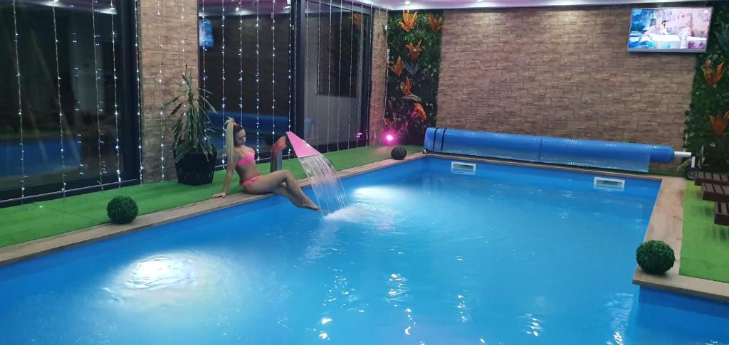 Bazén v ubytování Spa apartman zatvoreni bazen Maca nebo v jeho okolí