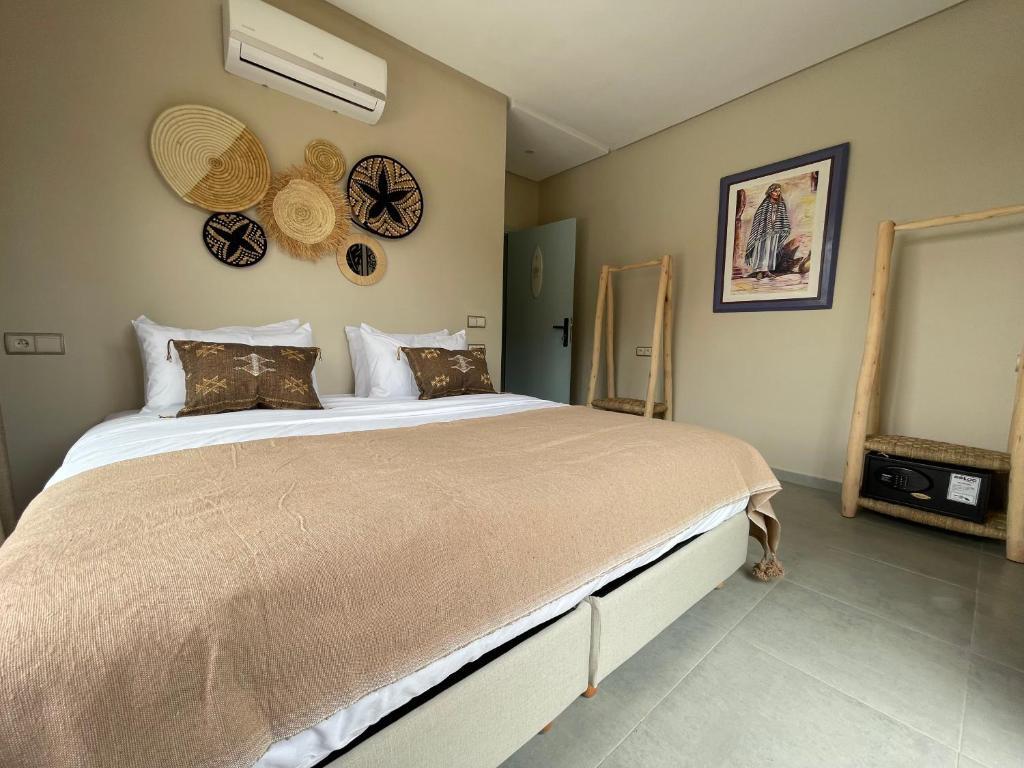 Postel nebo postele na pokoji v ubytování harmony surf lodge