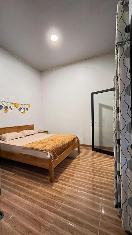Postel nebo postele na pokoji v ubytování Blij Ei - Land Hostel