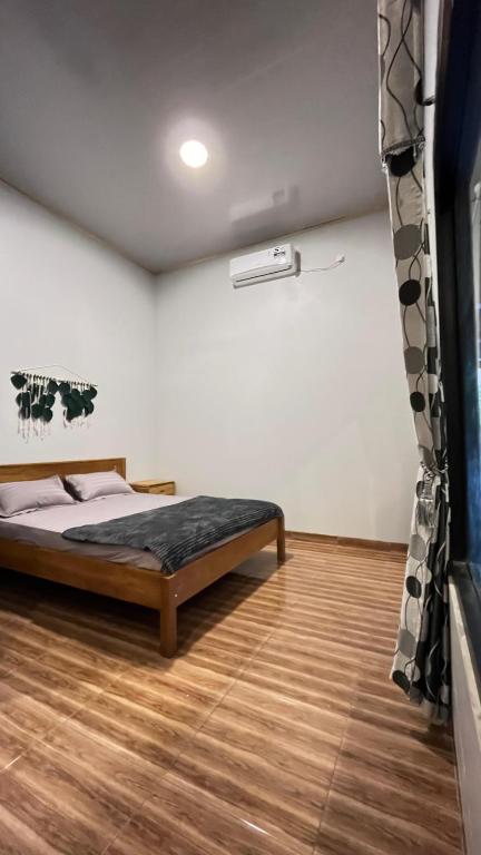 Postel nebo postele na pokoji v ubytování Blij Ei - Land Hostel