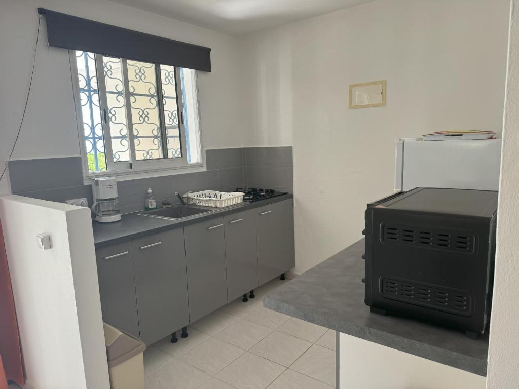 Kuchyň nebo kuchyňský kout v ubytování Villa Campêche