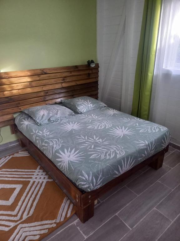 Postel nebo postele na pokoji v ubytování Hibiscus Paradise