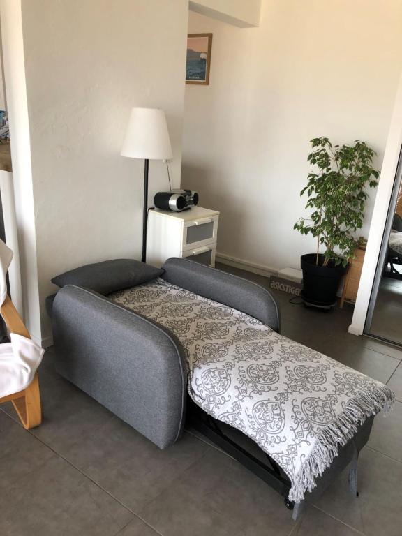 Ein Bett oder Betten in einem Zimmer der Unterkunft Anglet sables d'or - vue océan