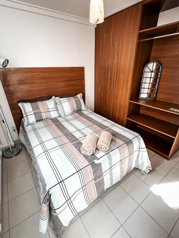 Postel nebo postele na pokoji v ubytování Estúdio Alpes
