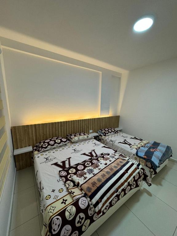 Postelja oz. postelje v sobi nastanitve Flat Ergli