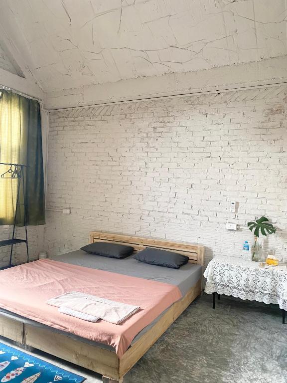 Postel nebo postele na pokoji v ubytování May's house (Nhà của Mây)