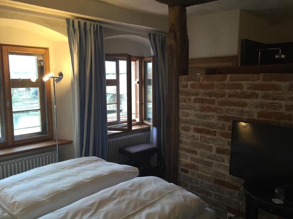 Postel nebo postele na pokoji v ubytování Hotel David an der Donau