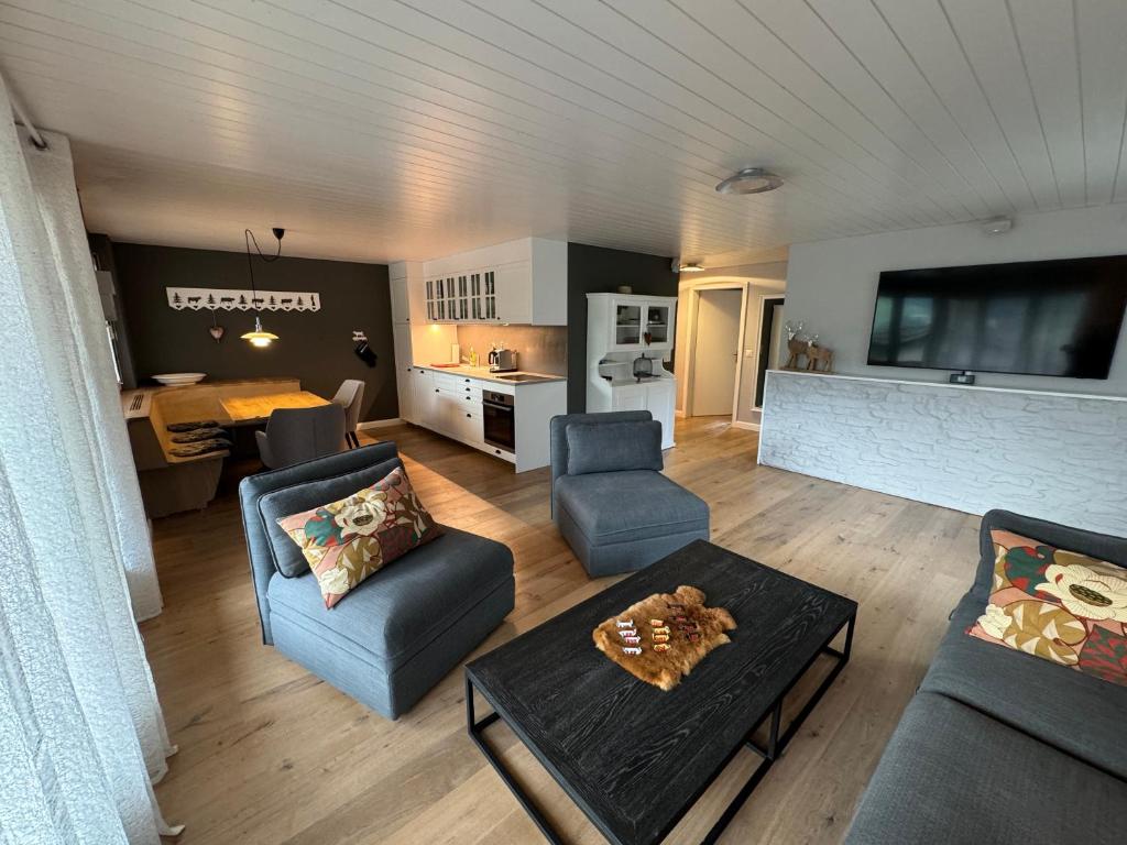 Posezení v ubytování Eigentumswohnung in Grindelwald