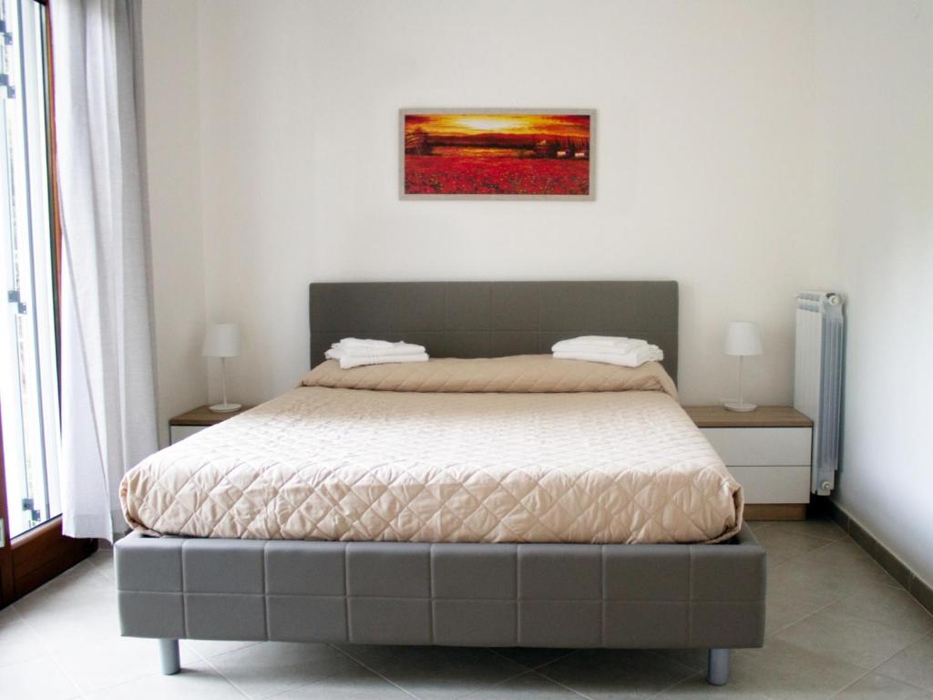 Katil atau katil-katil dalam bilik di Casa Vacanze Villa Matelda