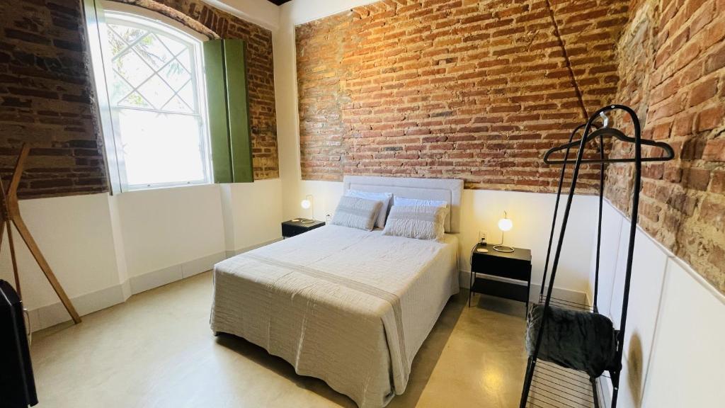 Postel nebo postele na pokoji v ubytování Vila Casarão - Casa de Hóspedes