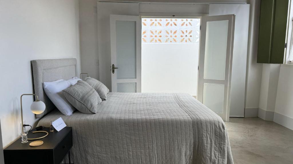 Postel nebo postele na pokoji v ubytování Vila Casarão - Casa de Hóspedes