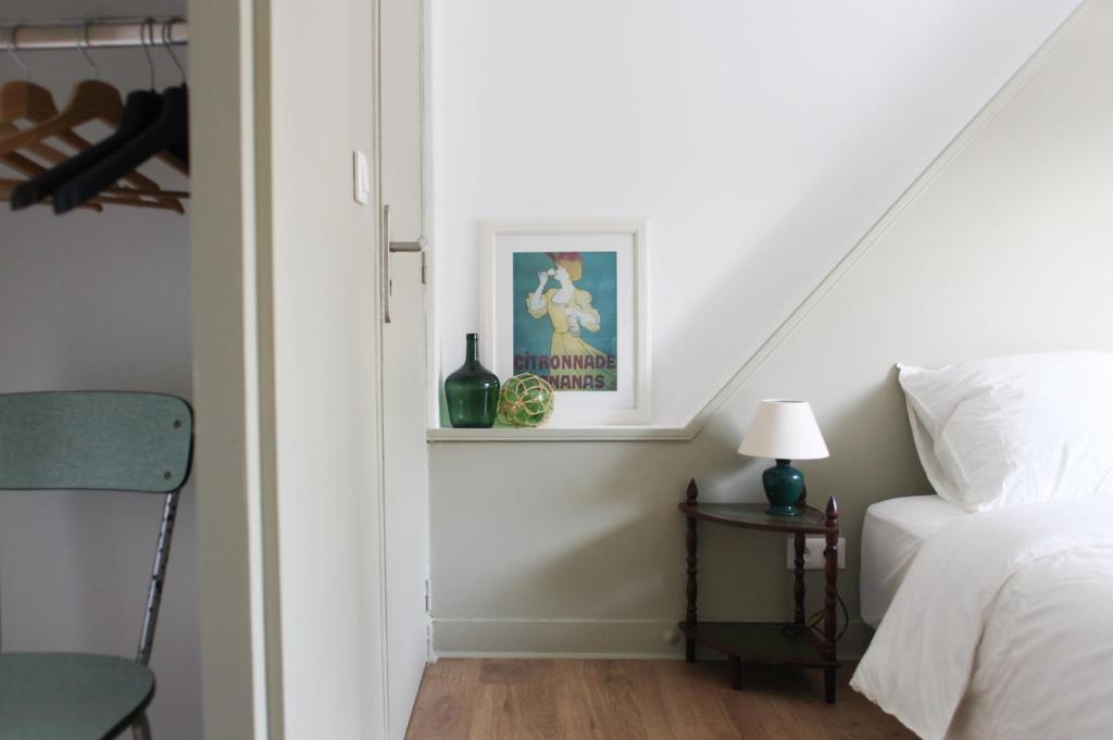 Postel nebo postele na pokoji v ubytování La Part Entière