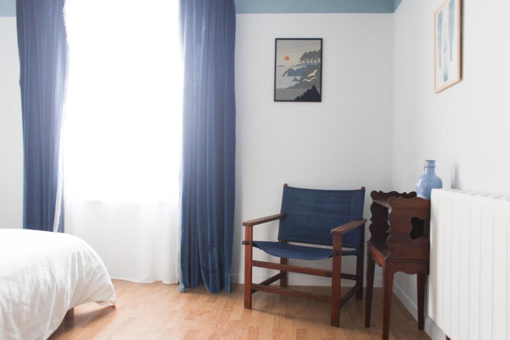 Postel nebo postele na pokoji v ubytování La Part Entière