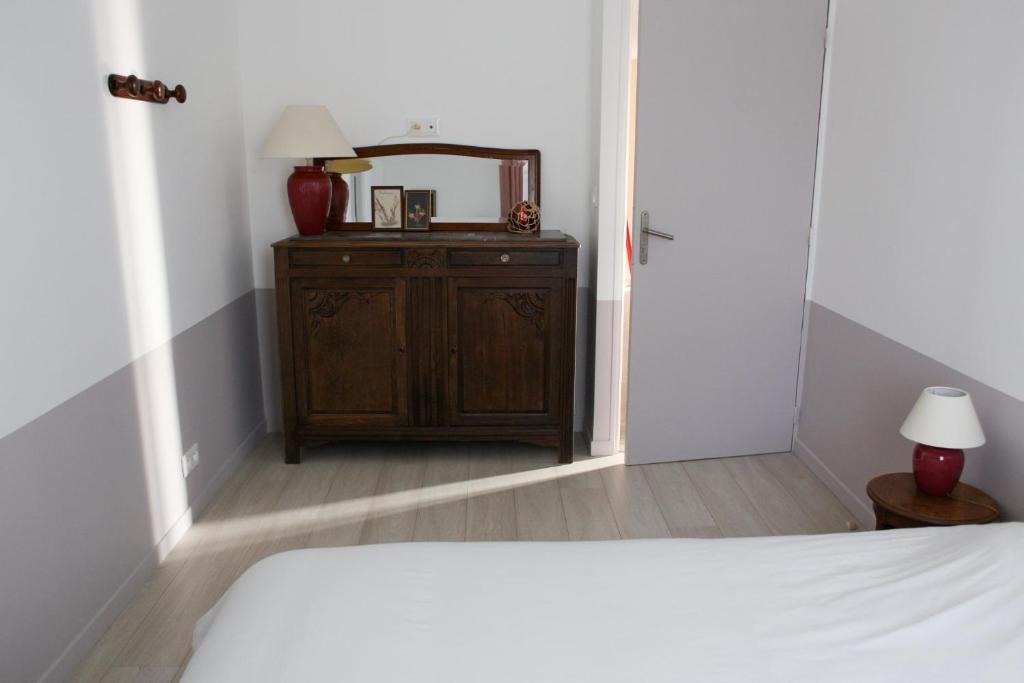 Postel nebo postele na pokoji v ubytování La Part Entière