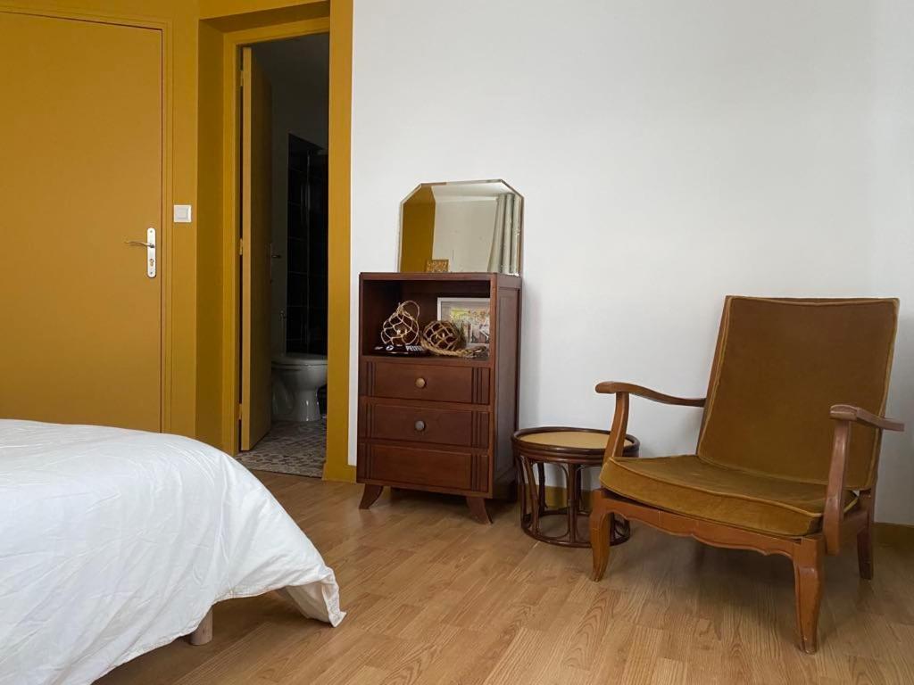 Postel nebo postele na pokoji v ubytování La Part Entière