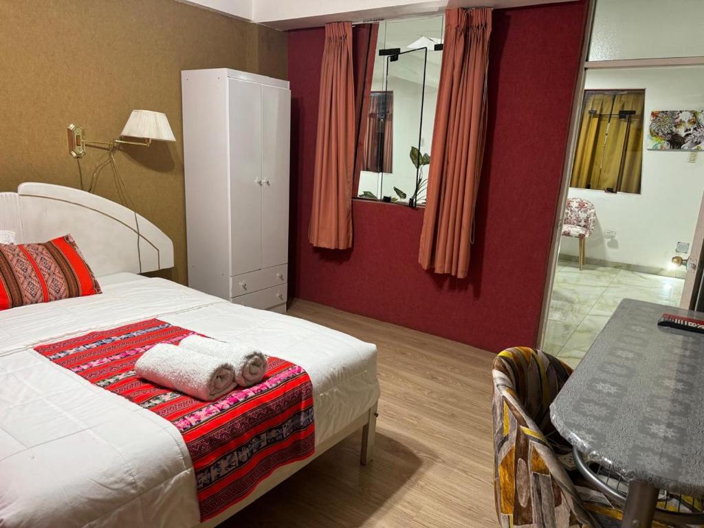 Letto o letti in una camera di Hotel Plateros
