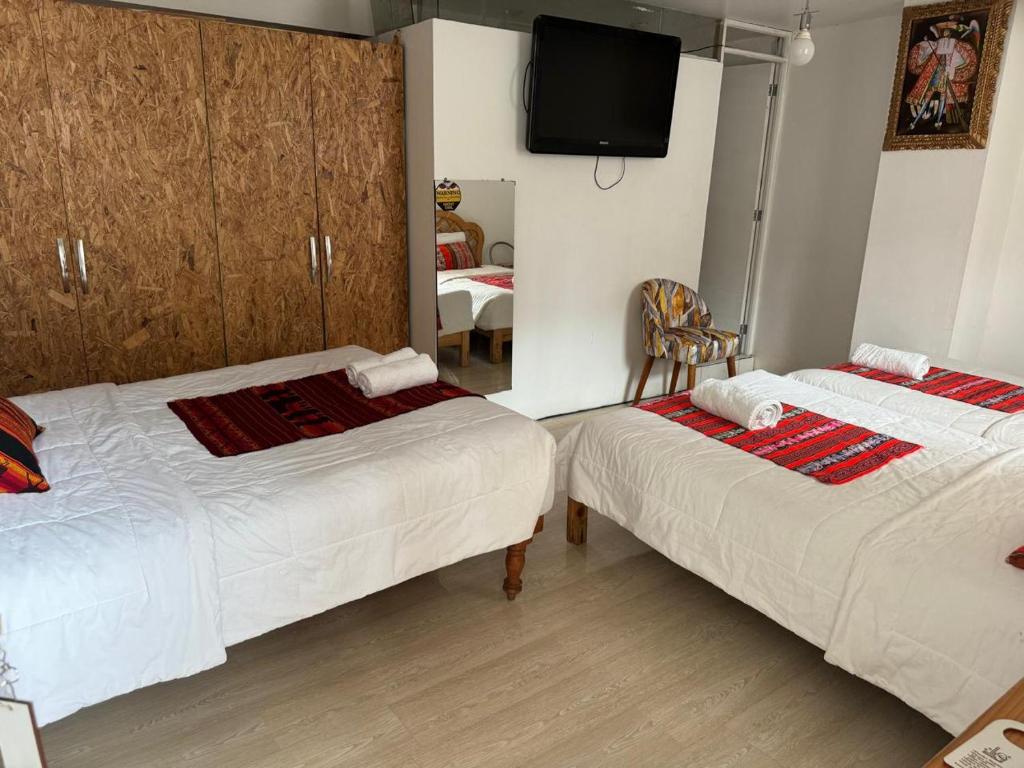 Letto o letti in una camera di Hotel Plateros