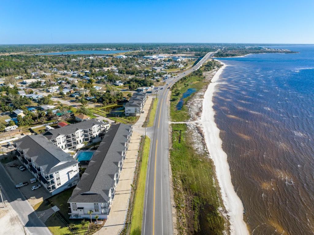 an aerial view of the beach and the ocean at One More Time Again by Pristine Properties Vacation Rentals in Mexico Beach