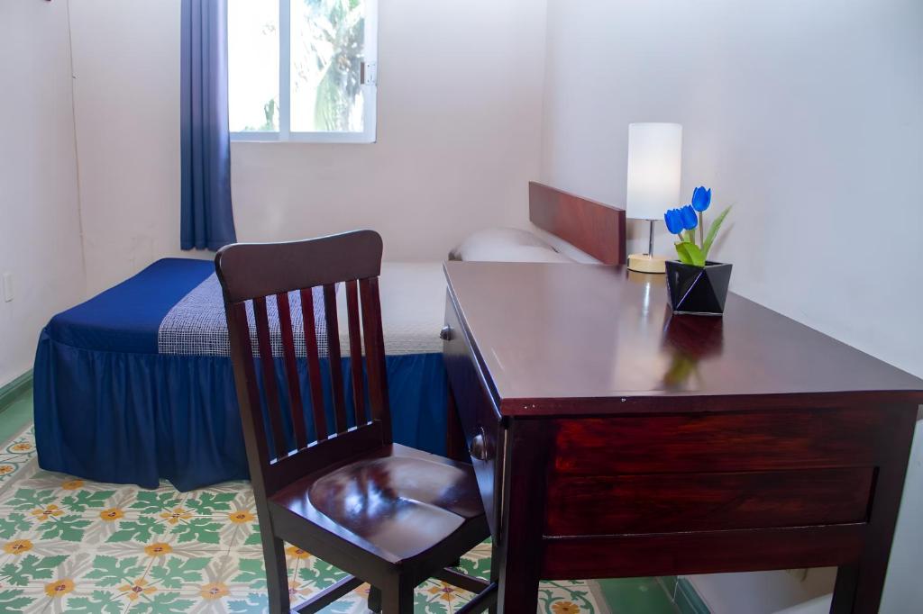Postel nebo postele na pokoji v ubytování Hotel Cortaza Galería