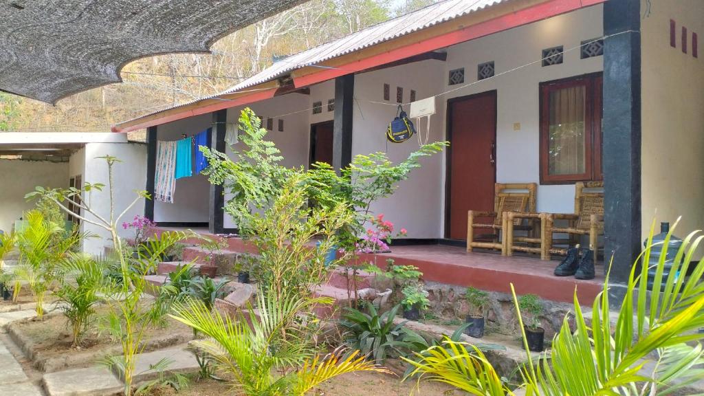 Zahrada ubytování Palm Homestay Kuta