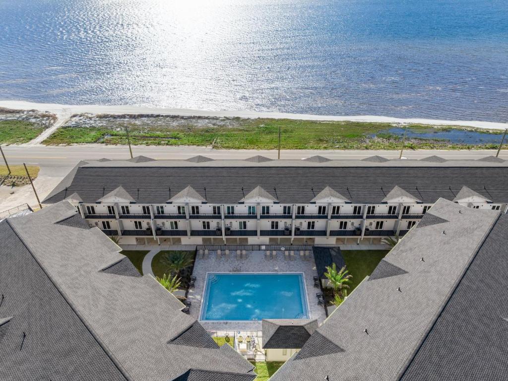 an aerial view of a resort with a swimming pool at One More Time Again by Pristine Properties Vacation Rentals in Mexico Beach