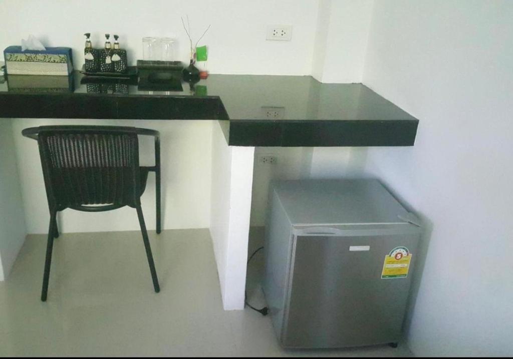 Kuchyň nebo kuchyňský kout v ubytování Phangan Guest House
