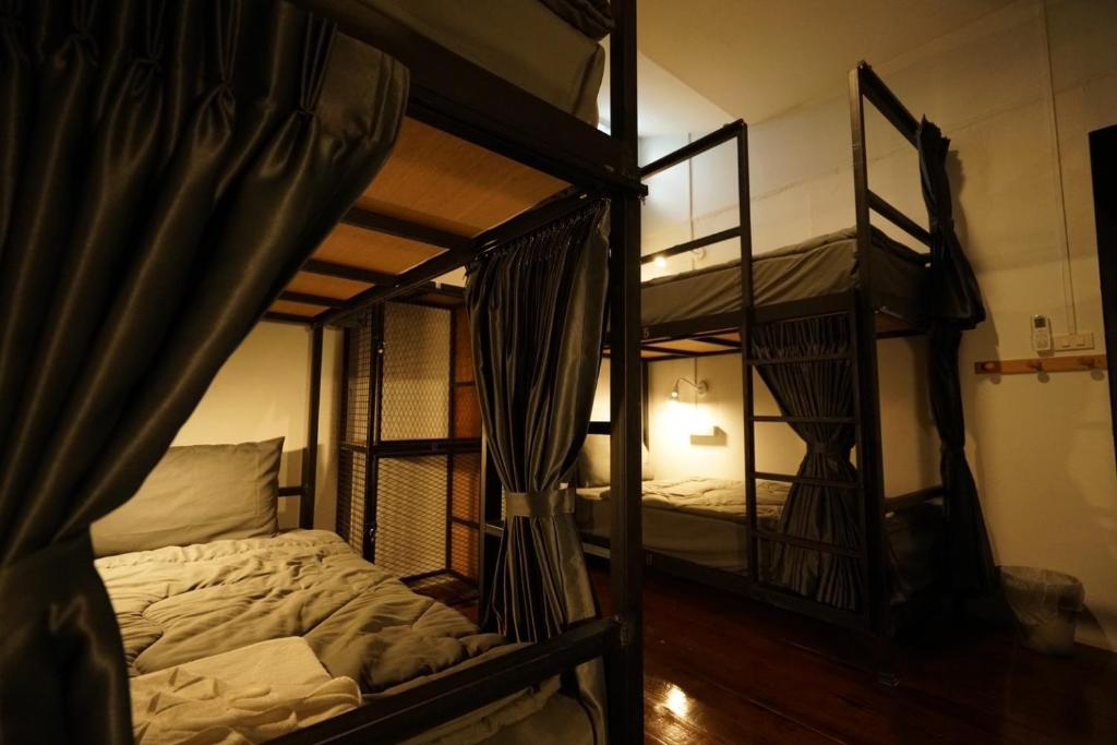 Postel nebo postele na pokoji v ubytování Amahostel