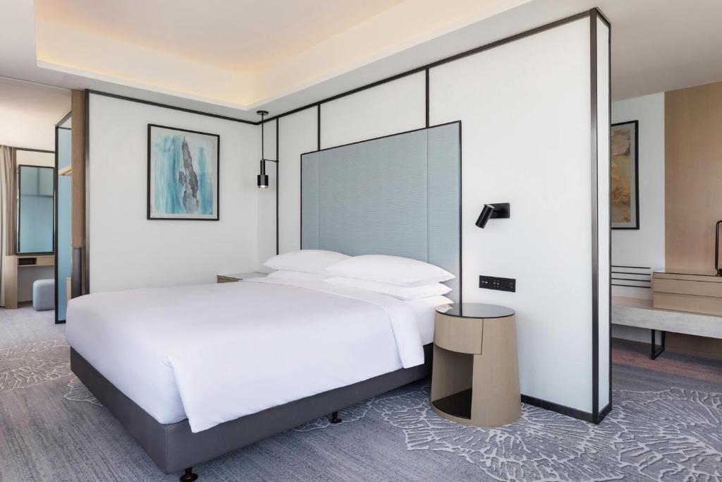 Krevet ili kreveti u jedinici u okviru objekta Four Points by Sheraton Hong Kong, Tung Chung