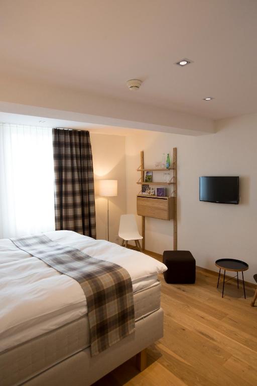 Postel nebo postele na pokoji v ubytování Boutique Hotel Moosegg