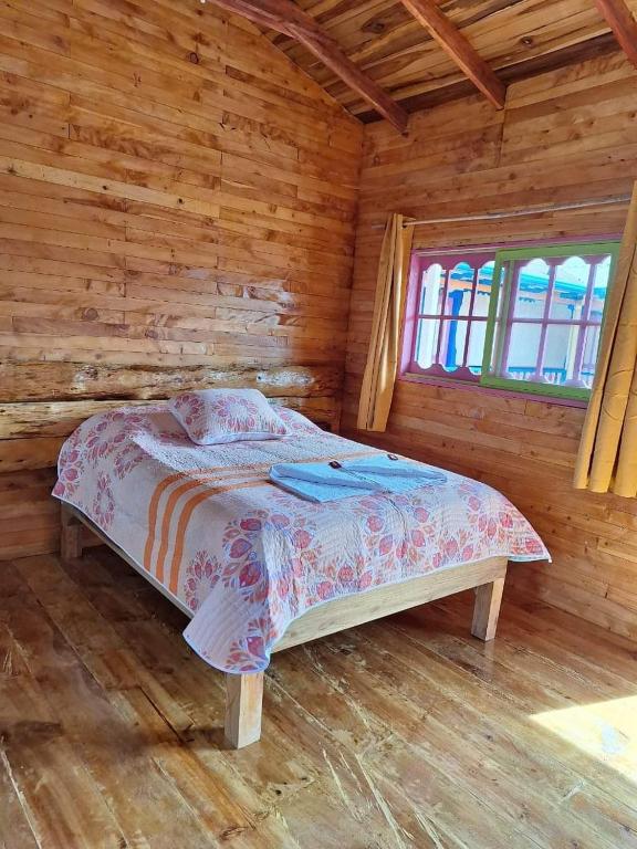 Ένα ή περισσότερα κρεβάτια σε δωμάτιο στο Hotel Areca