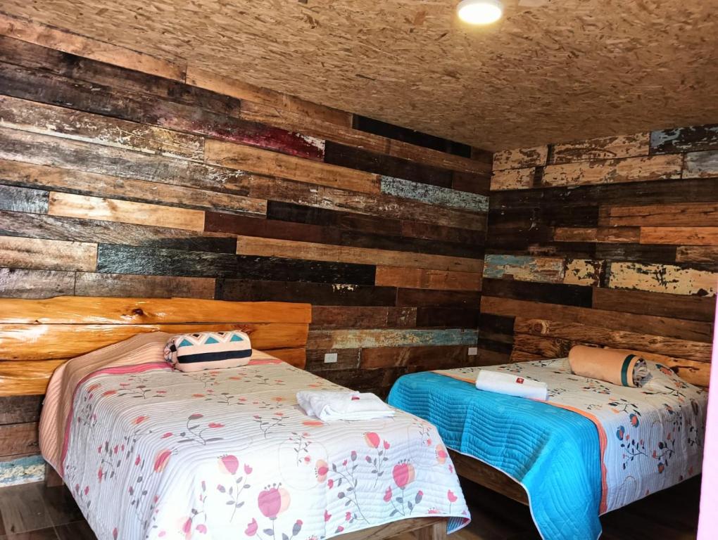 Ένα ή περισσότερα κρεβάτια σε δωμάτιο στο Hotel Areca