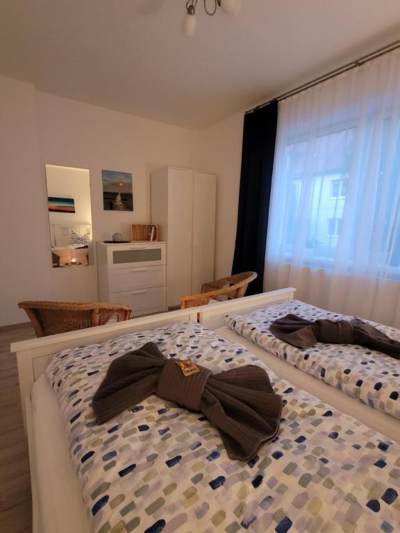 Postel nebo postele na pokoji v ubytování Ballenstedt Gartenblick