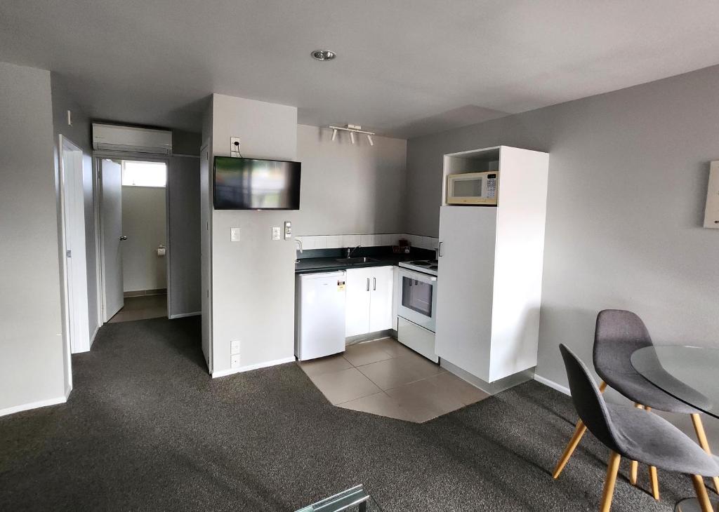 Kuchyň nebo kuchyňský kout v ubytování Lugano Motor Lodge