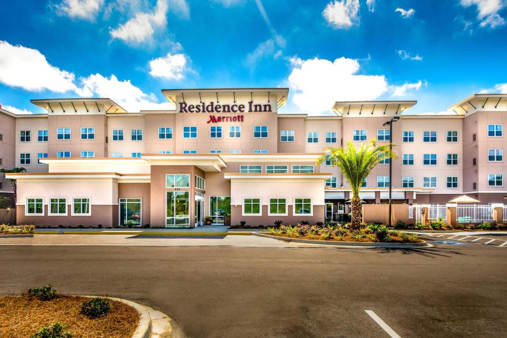 an office building with a street in front of it at Residence Inn by Marriott Savannah Airport in Savannah