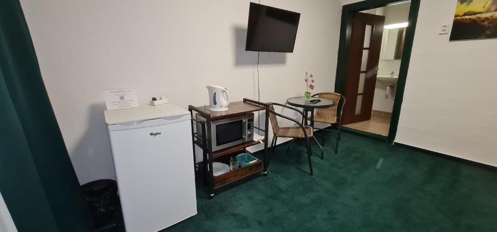 Kuchyň nebo kuchyňský kout v ubytování Apartmány Orlová