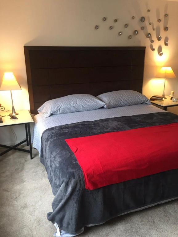 Postel nebo postele na pokoji v ubytování Casa Tavo King