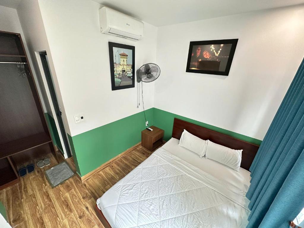 Postel nebo postele na pokoji v ubytování Nineties homestay