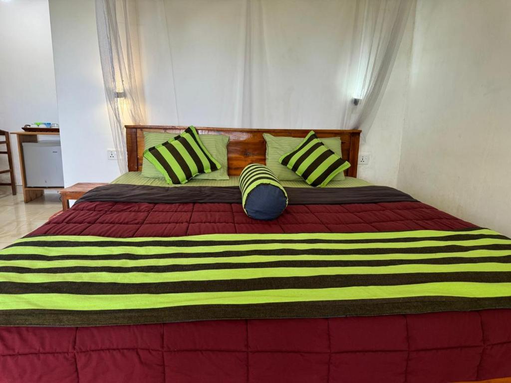 Postel nebo postele na pokoji v ubytování Felicity Inn