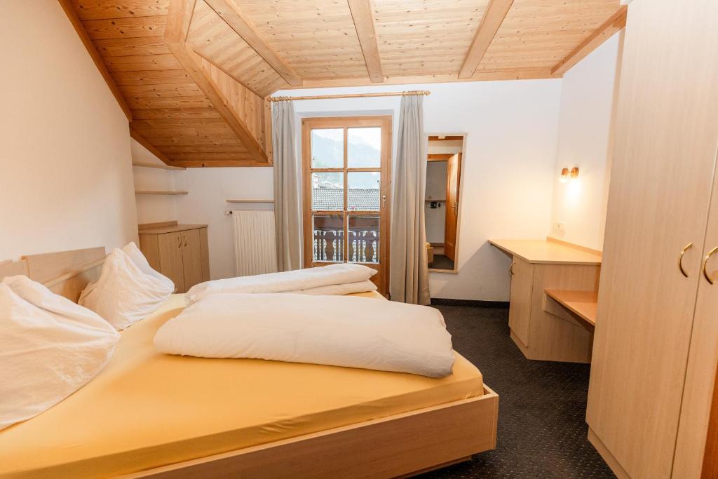 Postel nebo postele na pokoji v ubytování Apartment Obkircher