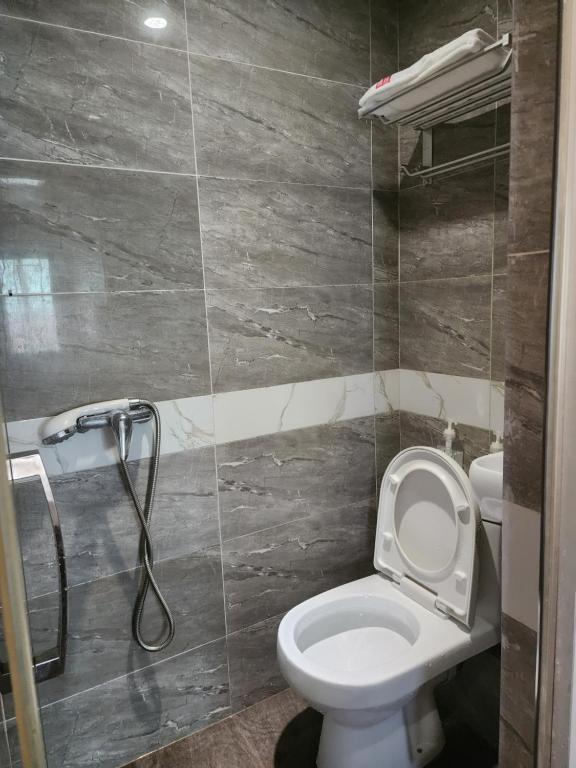 Vannituba majutusasutuses 香港金門賓館 KamMun Guest House