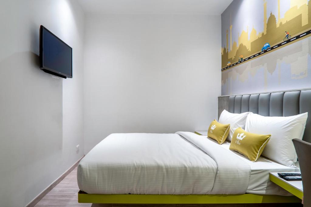 TV a/nebo společenská místnost v ubytování Hotel Le Roi Express Karol Bagh