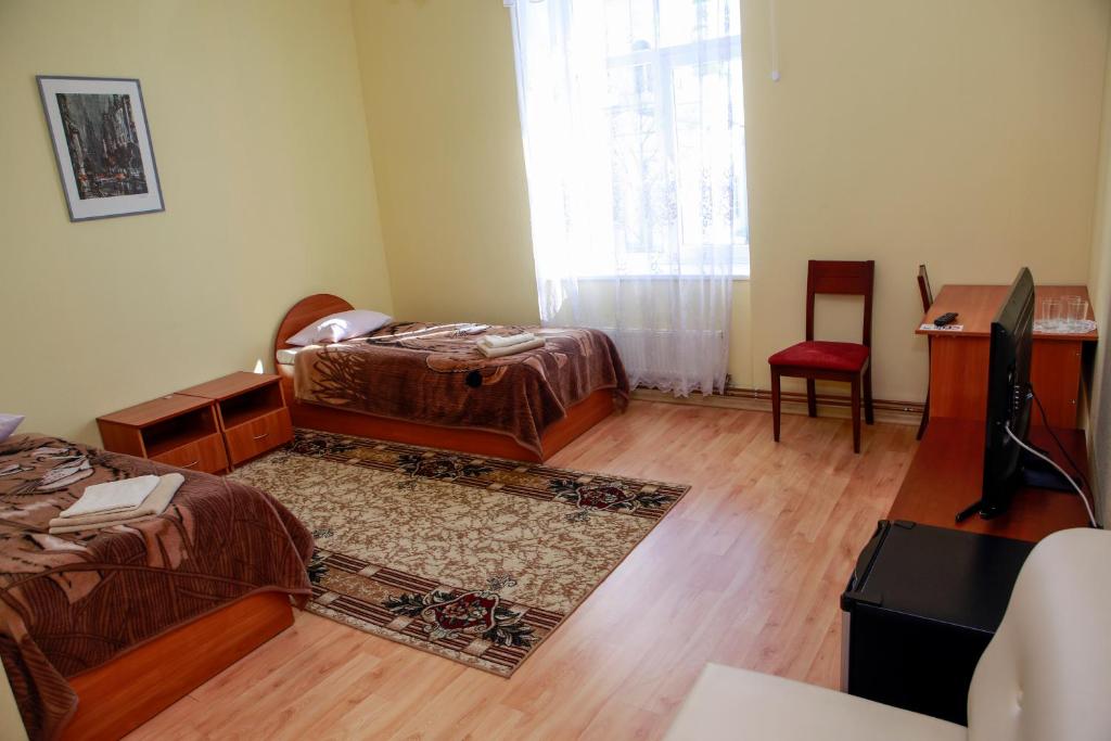 Postel nebo postele na pokoji v ubytování Lucia
